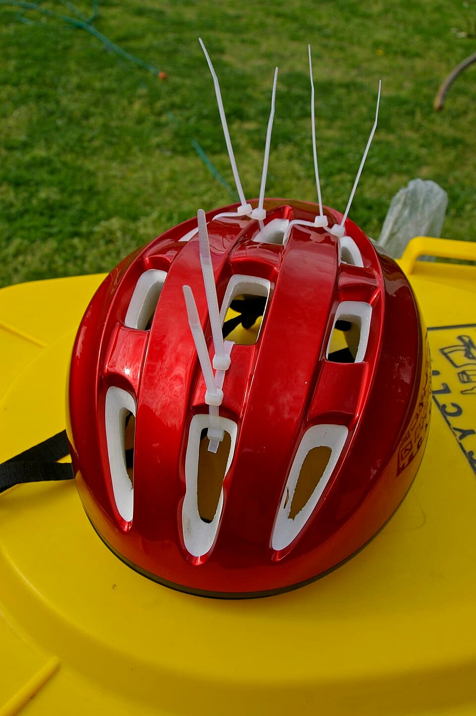 Bicycle helmet with zip-ties