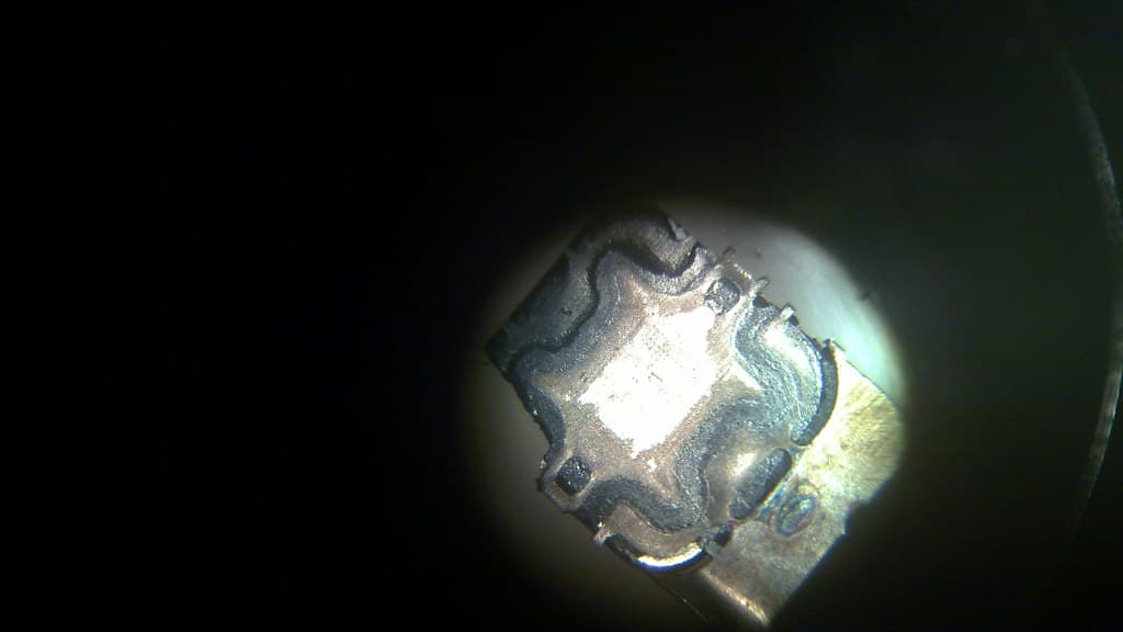Bus card Mifare circuit under microscope
