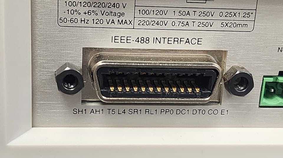 IEEE-488 port with listed capabilities on a laboratory temperature controller